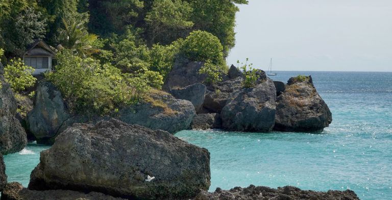 Hidden Beach Behind Cliffs Located in the Bukit Peninsula