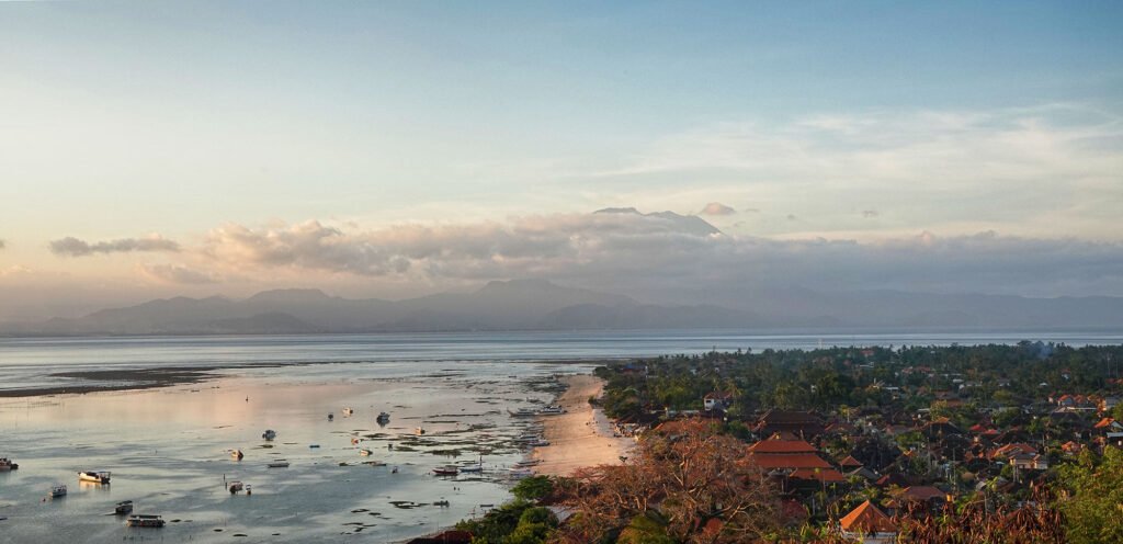 An epic sunset view of Jungutbatu Village during low tide.