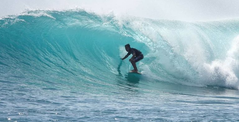Surfing the Powerful Wave of Lacerations, in Nusa Lembognan