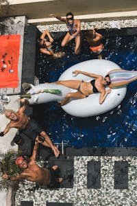 Fun day by the pool with friends in Bali, enjoying laughter and relaxation.