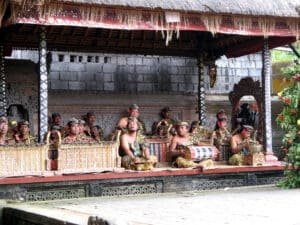 Barong Dance performers and gamelan musicians on stage at Batubulan Village open-air theater, Bali
