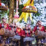 Traditional Balinese parade with drummers at the Carangsari Festival, Badung, Bali